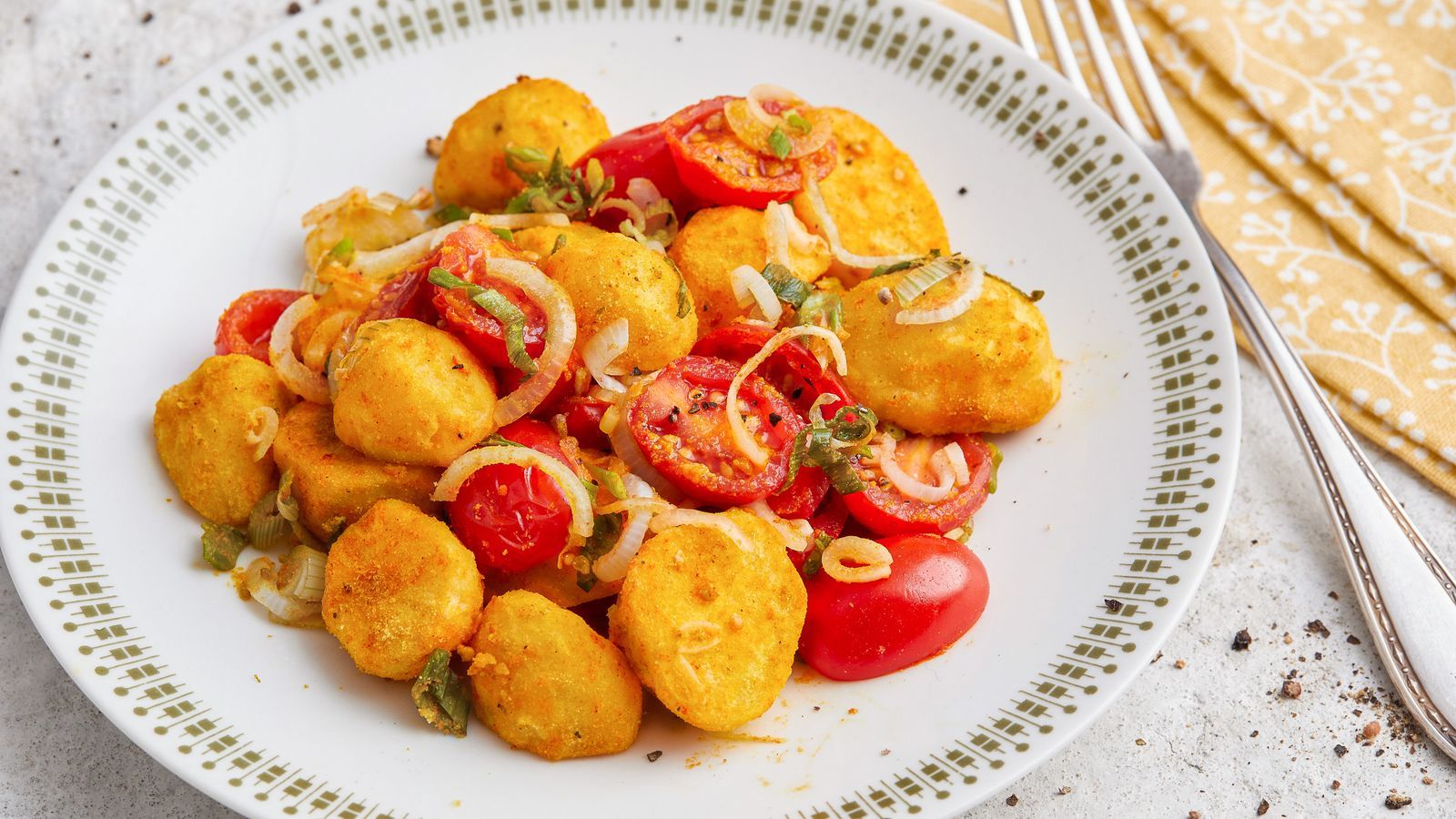 Indisch gewürzte Kartoffeln aus dem Ofen mit Cherrytomaten